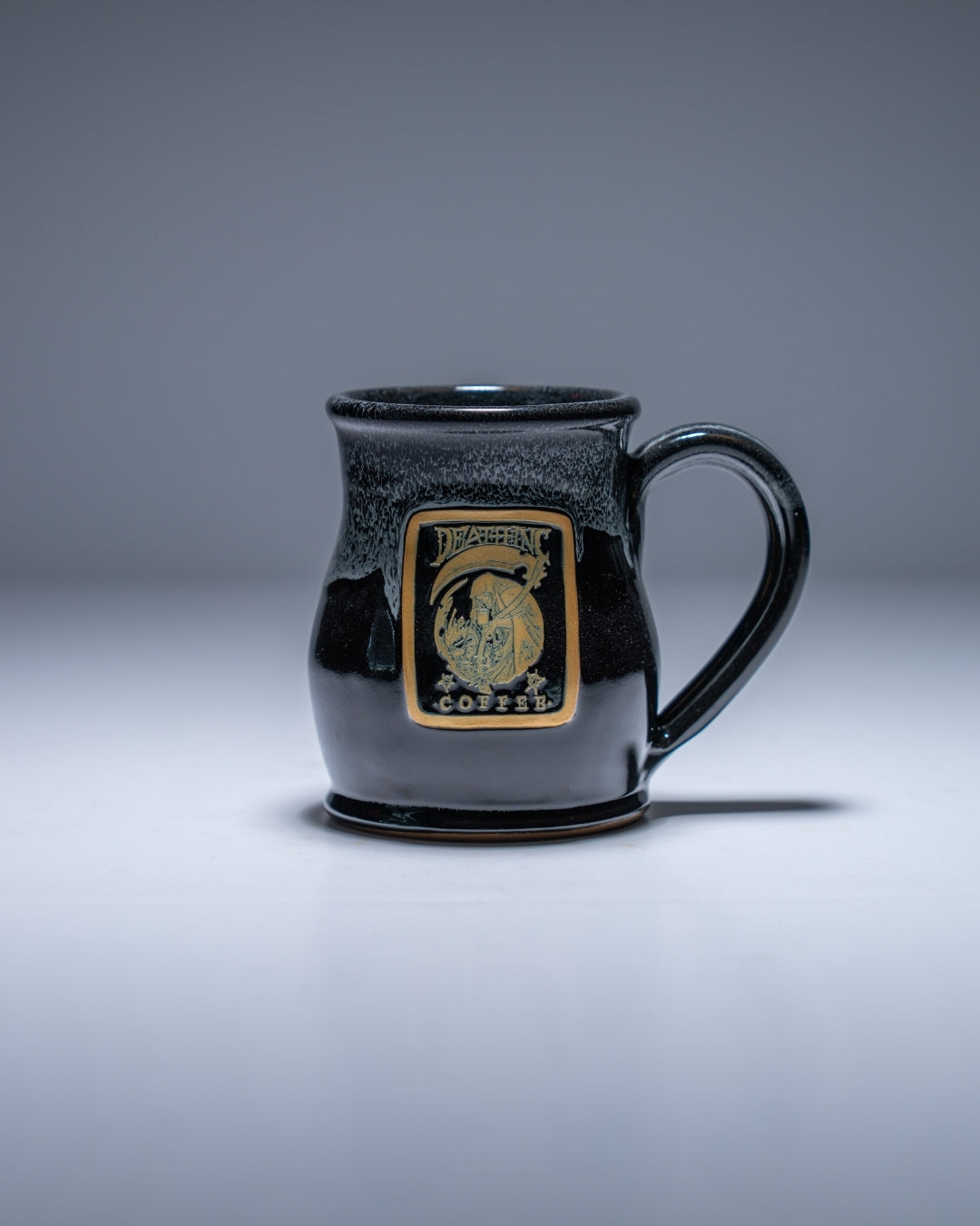 Death Inc Tall Belly Coffee Mug – Black with White Rim